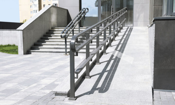 Outdoor stairs with ramp and metal railing