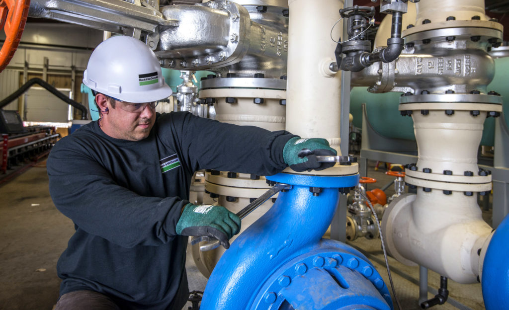 B&M's service technician at a client site providing mechanical maintenance services