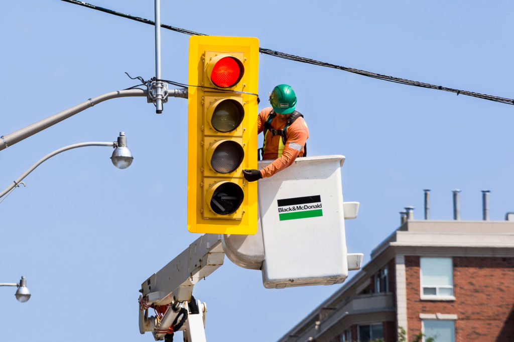 B&M's traffic engineering expert installing intelligent mobility system at a traffic signal