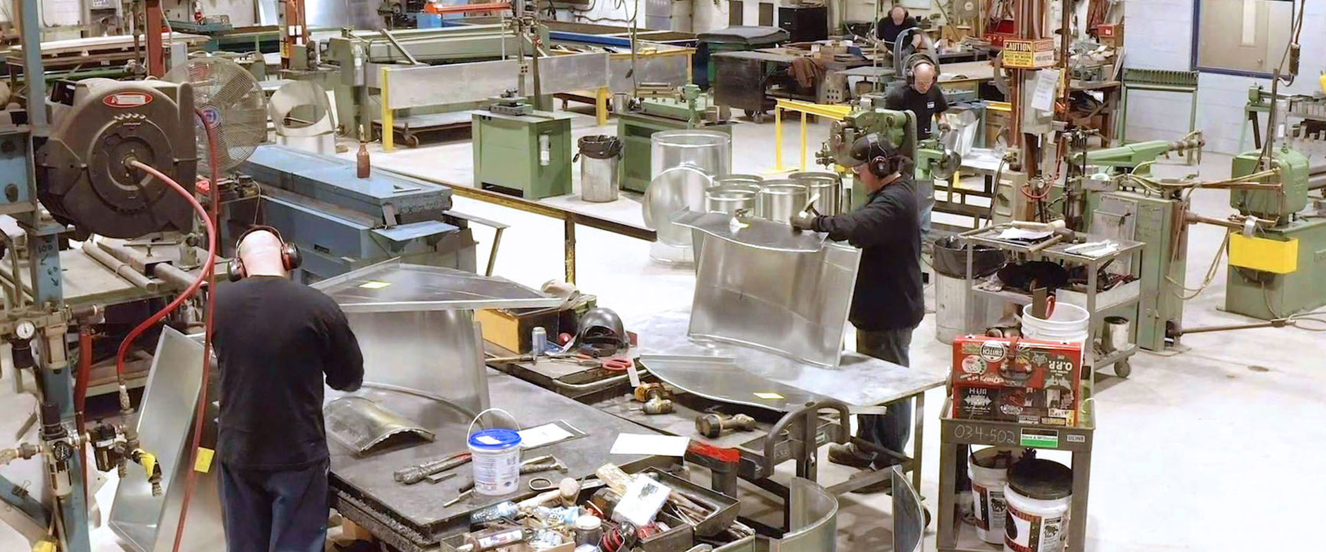 Black & McDonald’s sheet metal and custom fabrication group working at a B&M facility
