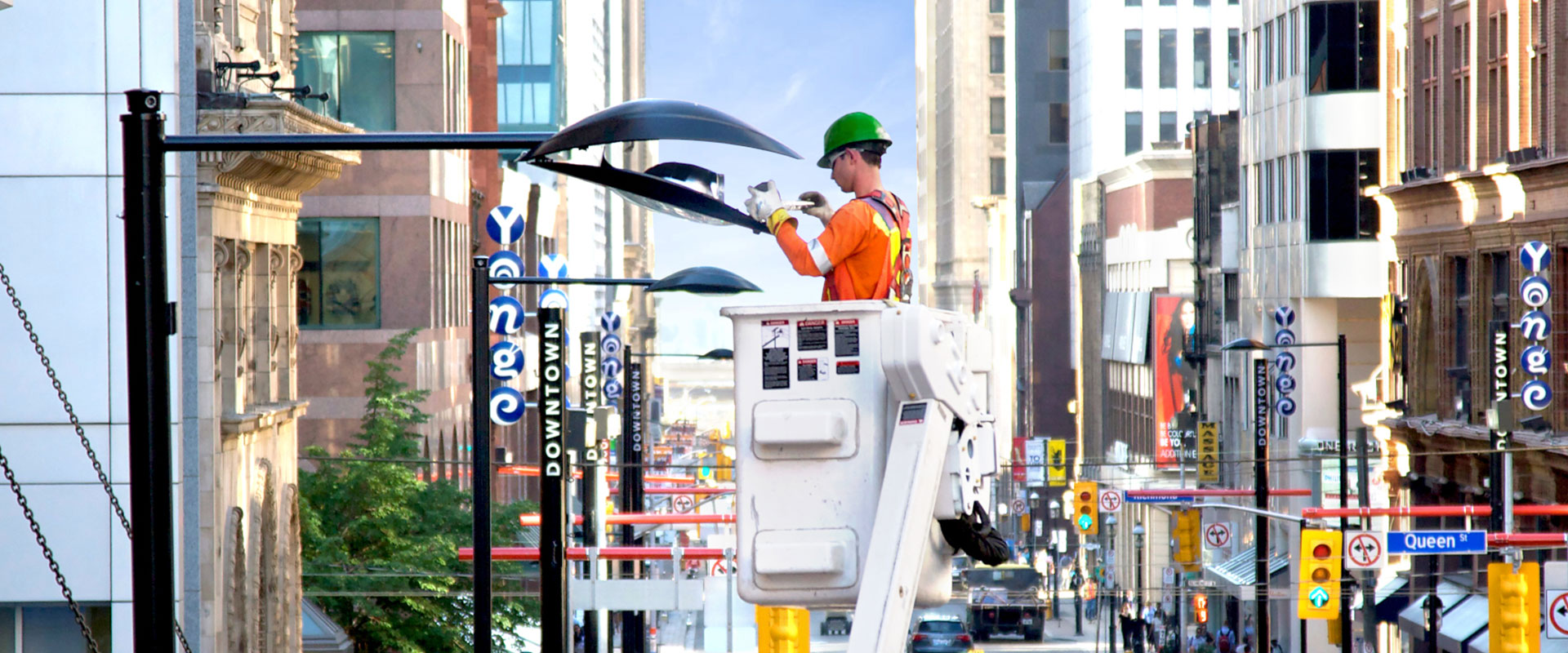 B&M technician performing street light maintenance service