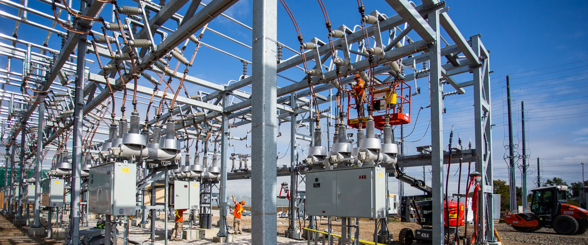 A team of Black & McDonald tradesmen working on the construction of a high voltage substation