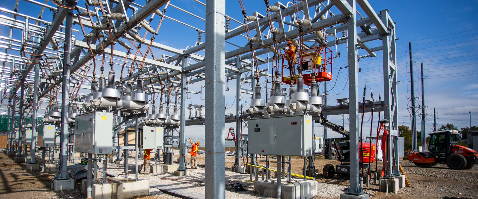 A team of B&M electrical tradespersons working on a construction of a high voltage substation